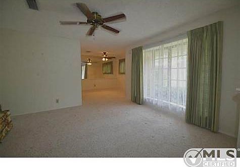 Formal Living Room flows easily to dining room