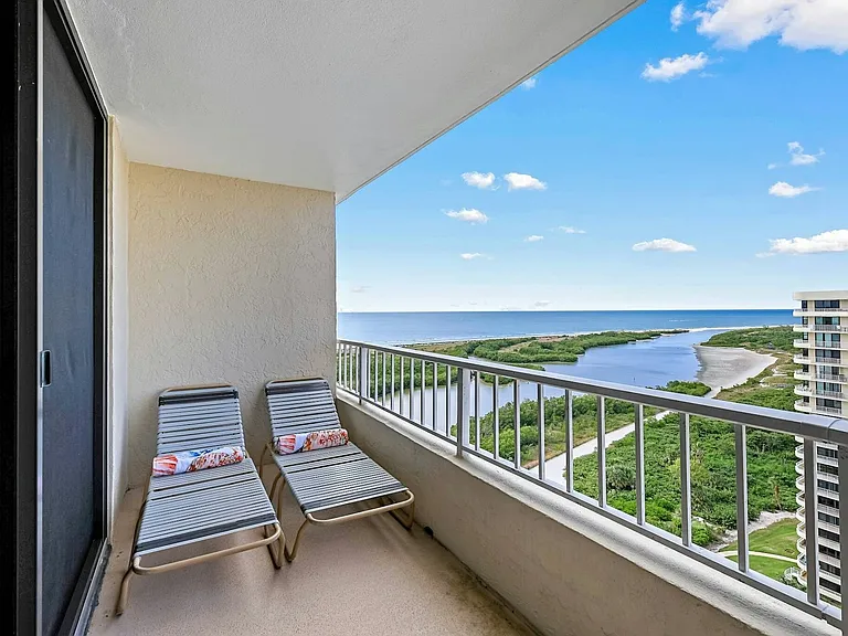 Private balcony with stunning beach and sunset views