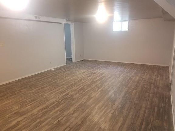Large living room area off the dining room open to the kitchen