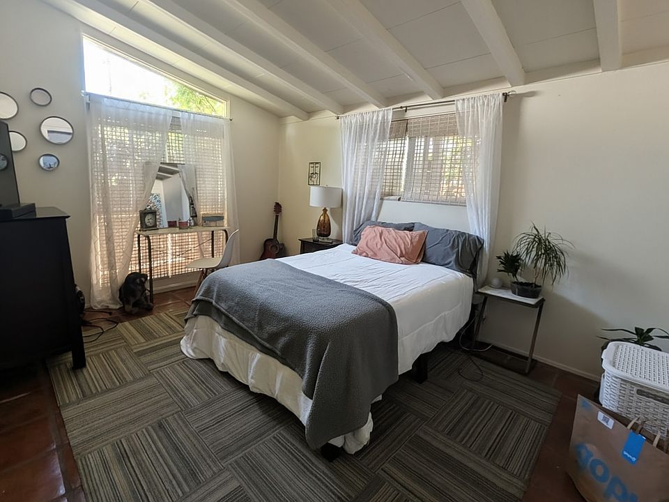 Room shown with some of current roommate's belongings in it.