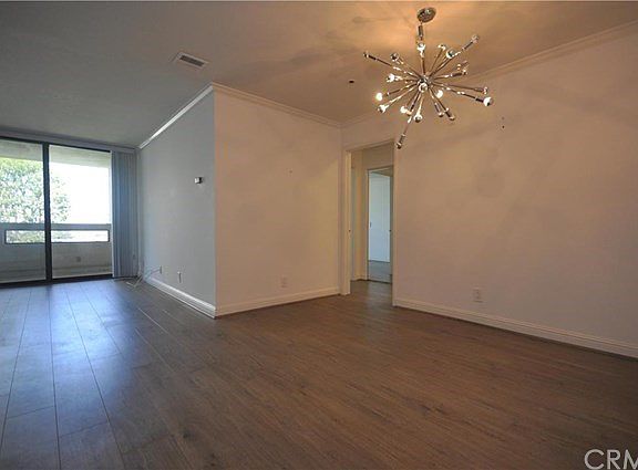 Dinning room and living room view from unit entrance.