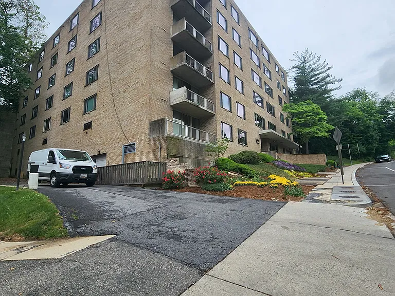 The white truck is coming from the Lower Garage onto Porter Street where you will turn and use your security card to open the garage door and park in your dedicated space.