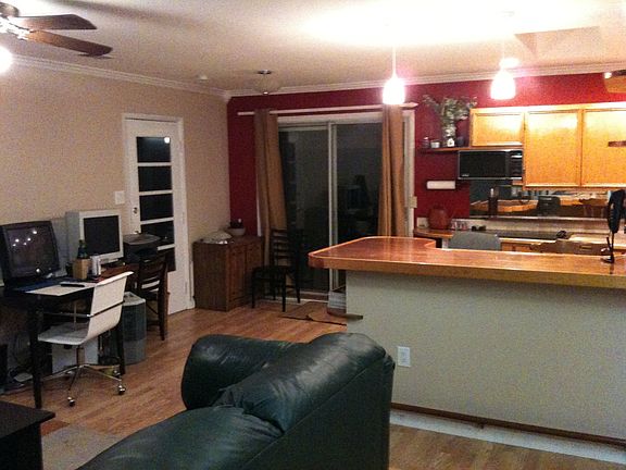 kitchen/dining with countertop and patio door