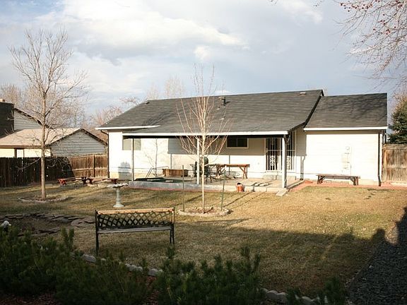 Professionally Landscaped Yard With  Small Pond