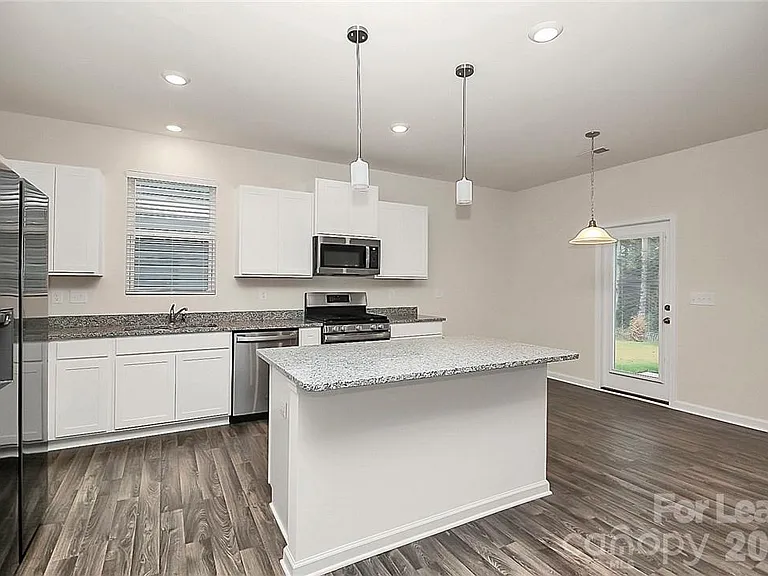 7306 Wheyfield Dr — Photo 3