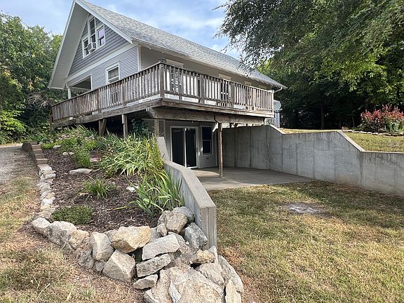 Outside view. Deck and patio.