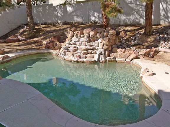 bubble tech pool with waterfall (landscaping is being completed)