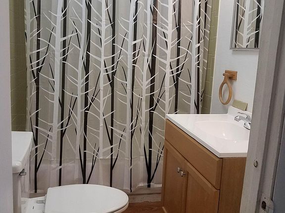 1st floor full bath off of laundry room.