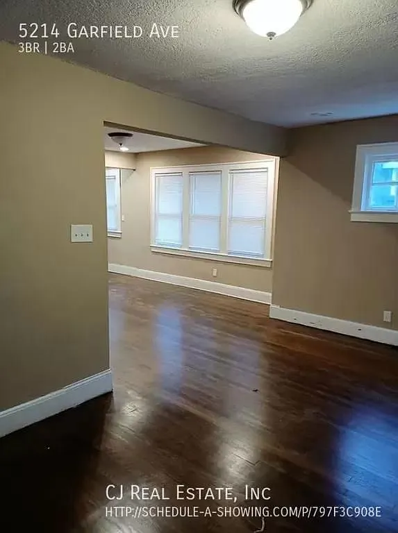 Charming 2-Bed Single Family Home with Central Air and In-Unit Laundry — Photo 2