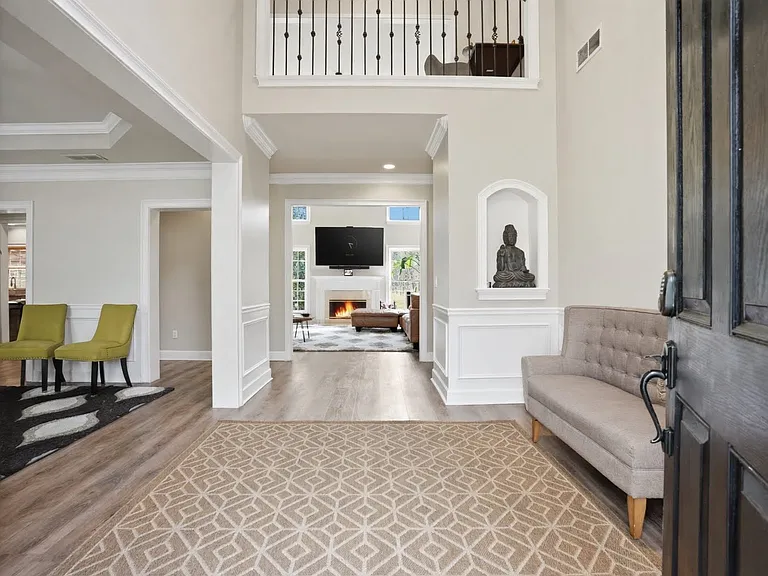 Welcoming entry that opens into a bright, open interior