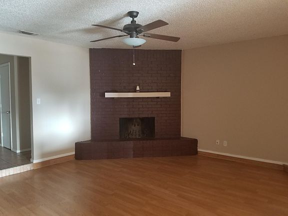 Large and beautiful living room with fireplace