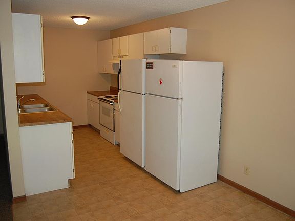 Kitchen with two fridges