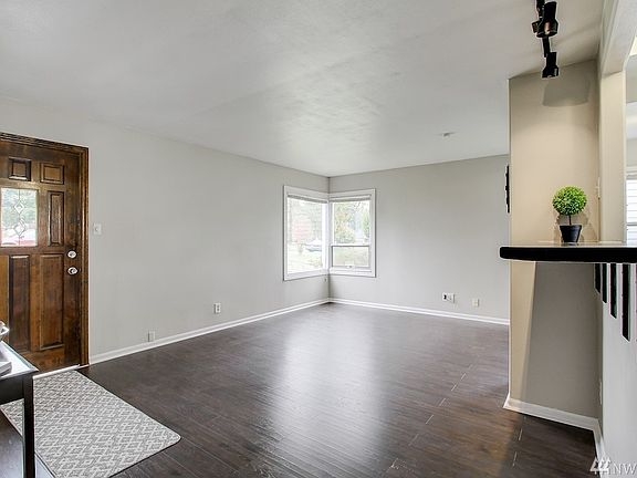 Boasts loads of natural light from large double pane windows.