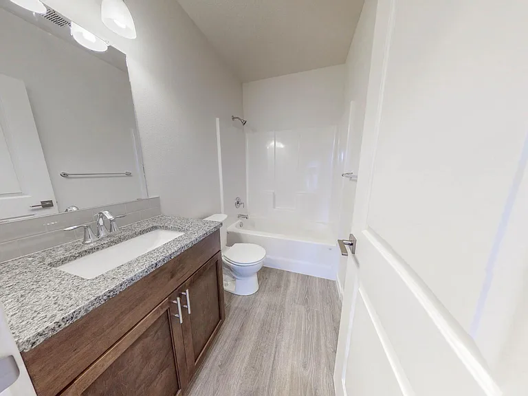 Main bathroom with tub/shower combo
