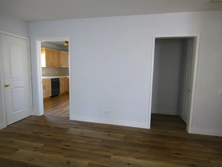 Living Room Access to Either Kitchen or Hallway to Downstairs Bathroom or Garage
