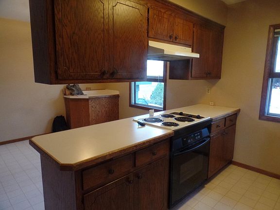 Galley Style Kitchen with view of Eat-In Area