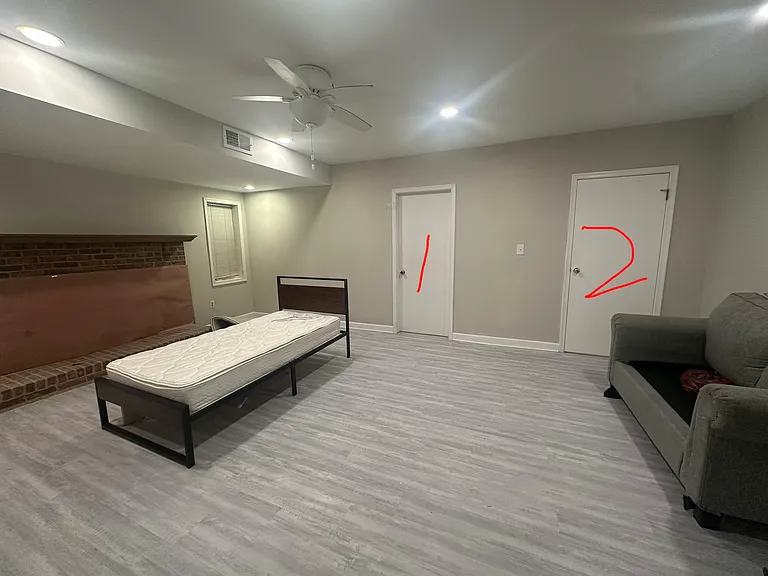 Two bedrooms and one living room with real fireplace.
