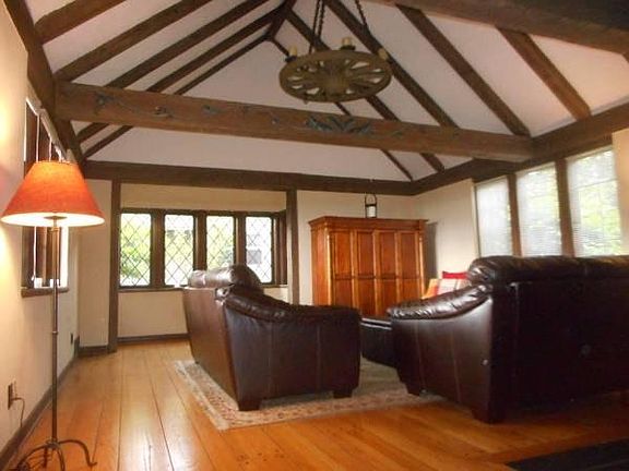 Living room with vaulted ceiling and beautiful woodwork