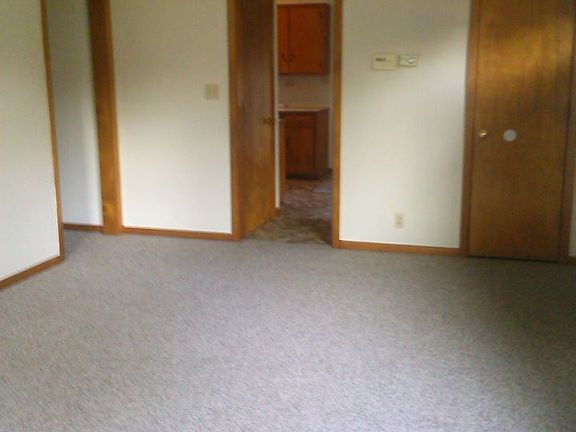 living room with coat closet