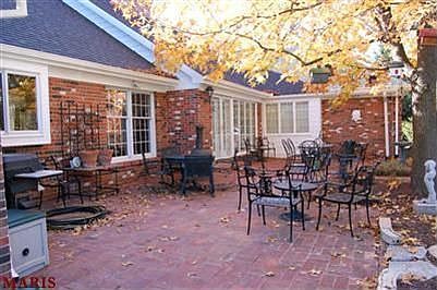 Lovely Patio overlooks incredible backyard