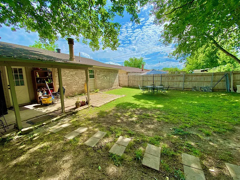 spacious back yard, large covered porch