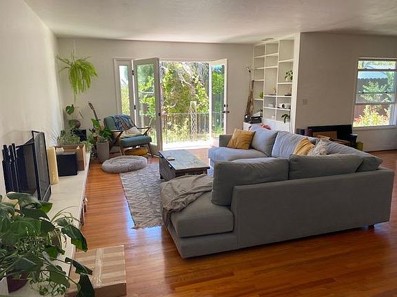 leaving room with a fireplace