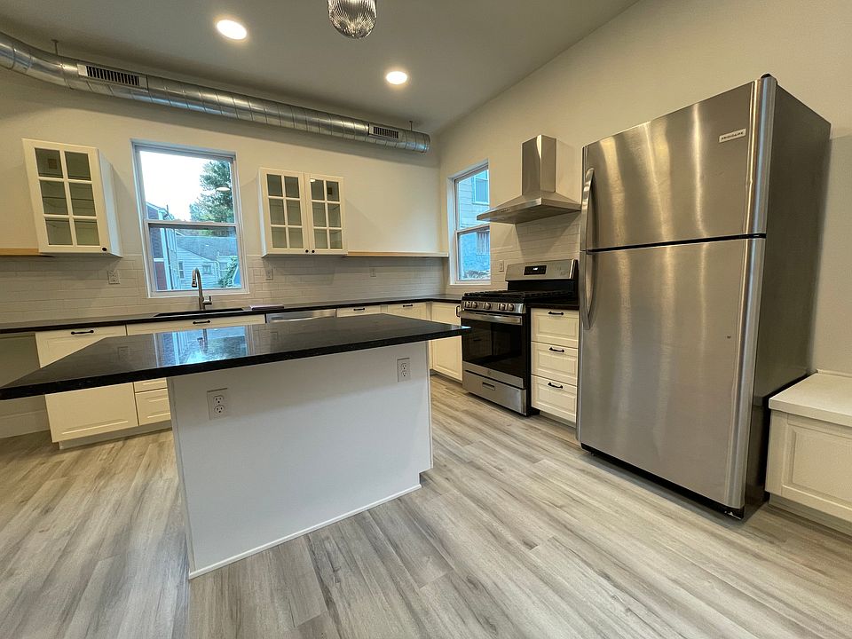 Kitchen has loads of counter space and storage