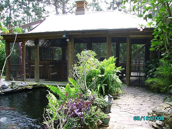 Pond  and enclosed tiki bar