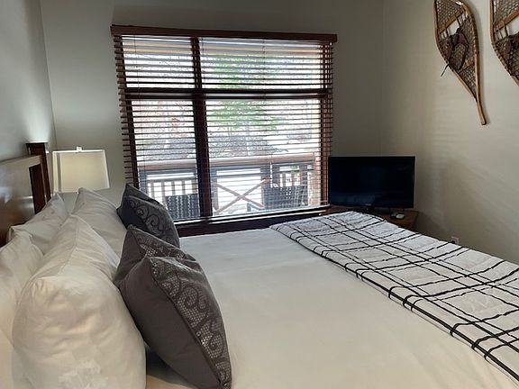 New flat screen TV installed on the wall.