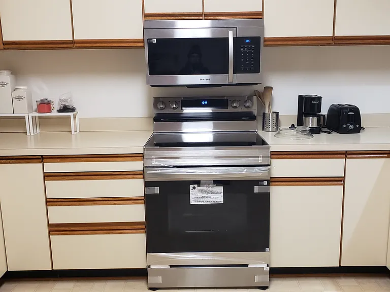 Brand new stove. Brand new microwave.