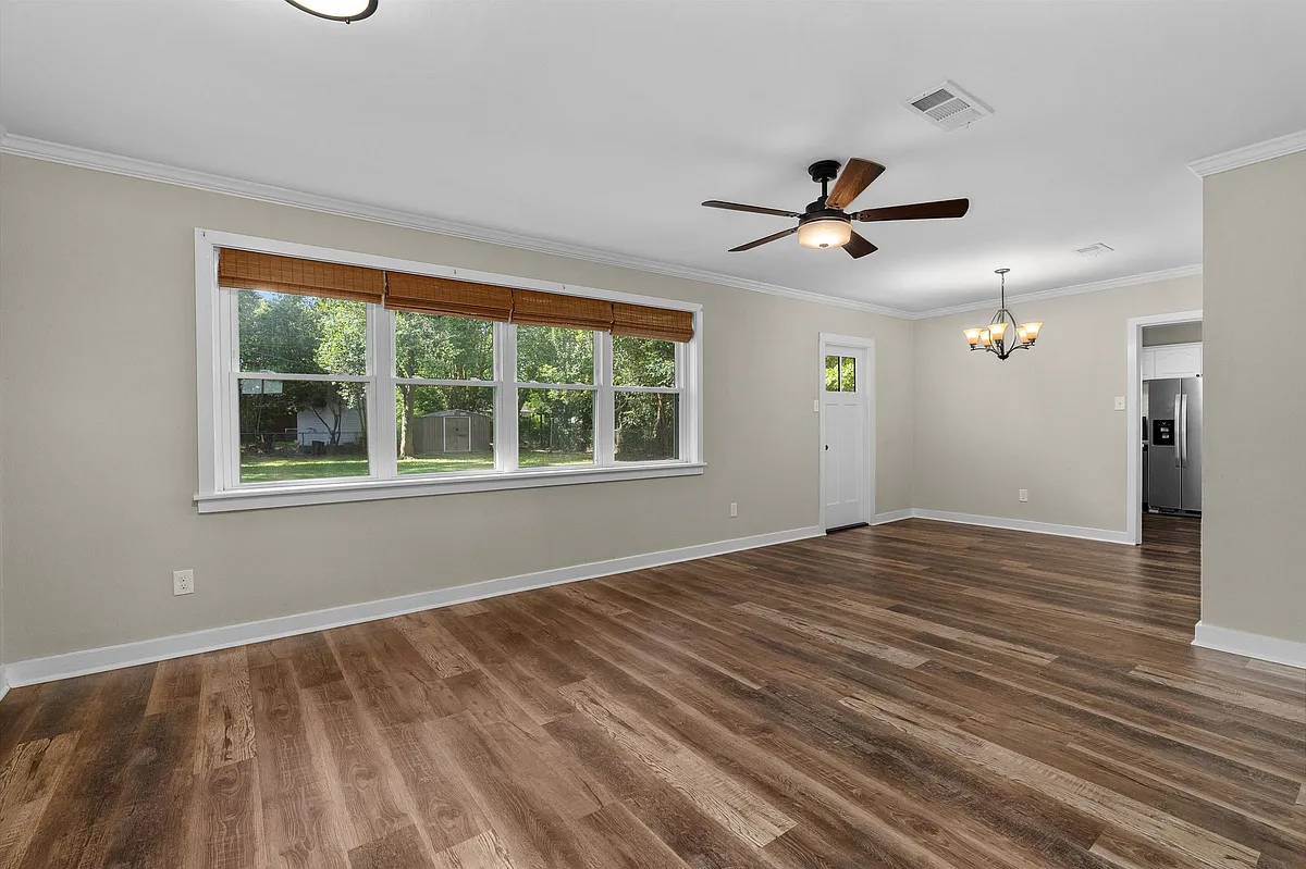 Large Open Living space with natural light and access to the rear yard - 119 Charles Ave