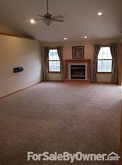 L.R. w/vaulted ceiling & fireplace