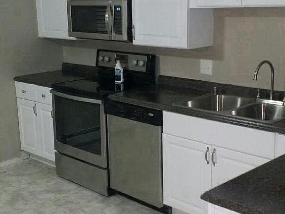 New Stainless Steel Appliances - Has Disposal and Microwave