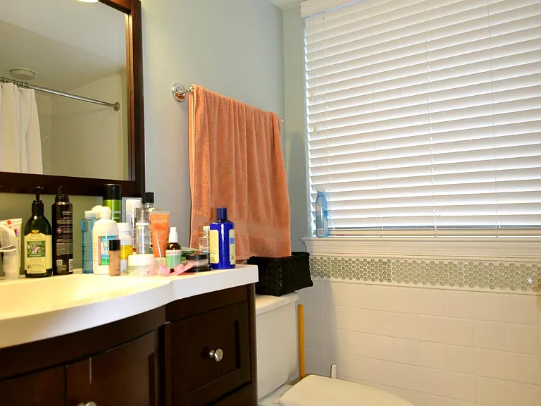 Updated bathroom with modern vanity and finishes