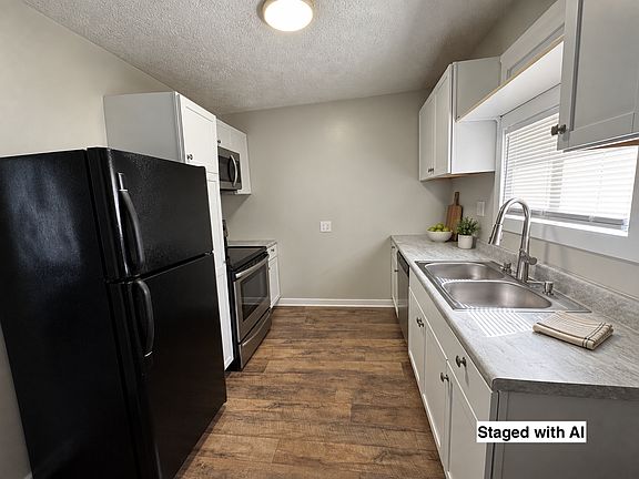 4th image of 303 E 3rd St