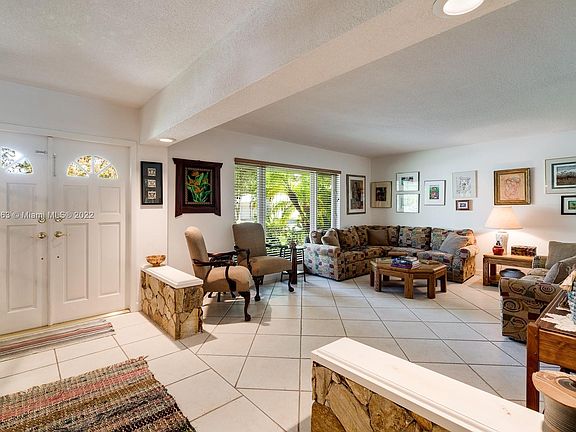 Foyer entry and the Liv/Diningroom/Kitchen/ Familyroom/4thBdrm or Den/office have ceramic tile floors. Notice the wide