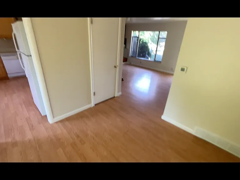 Living Room and Kitchen viewed from Dining Room