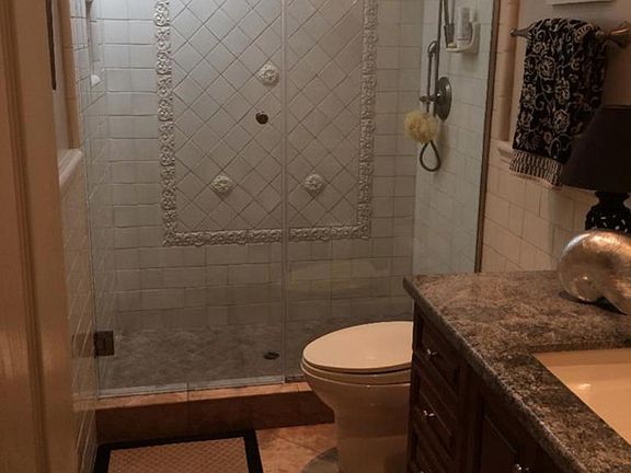 Master bathroom with shower stall