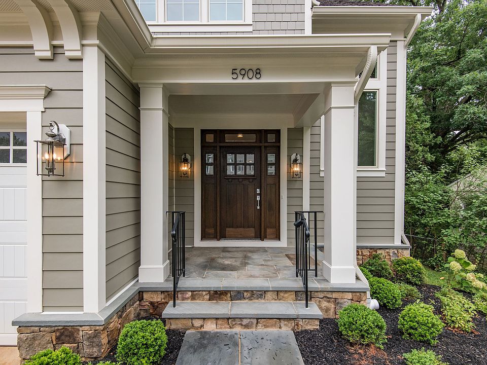 Stone base, covered entry, arrival done right