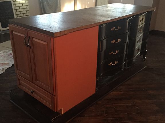 Cabinet has microwave in it