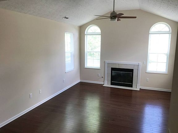 The living room features 2 Palladian style windows, 2 side w