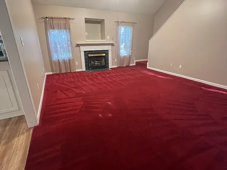 View of living space going to the upstairs bedroom/bonus room