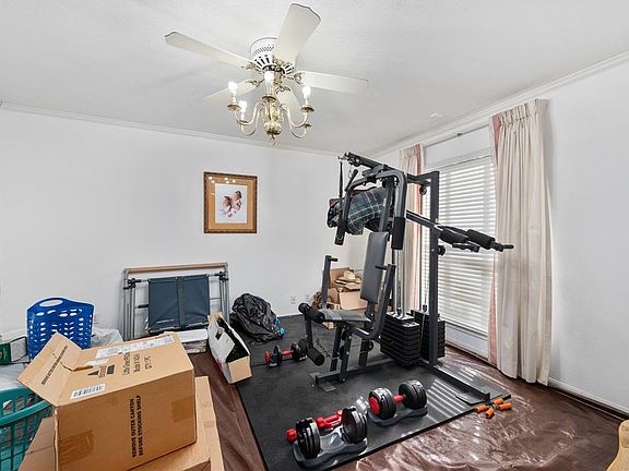 Seller is moving out. This is the formal dining room, currently being used as a workout room.