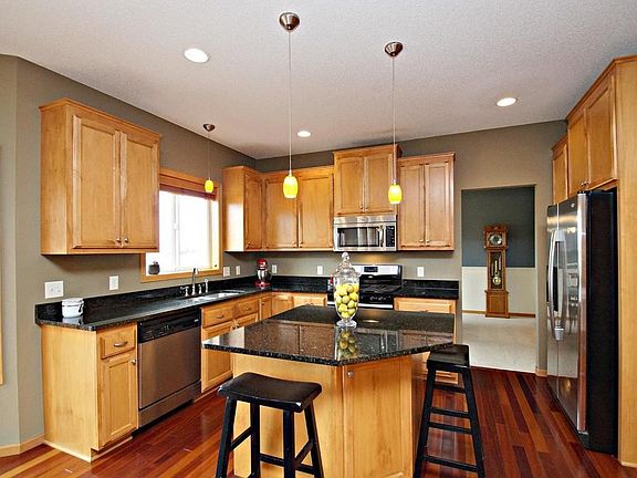 Beautiful, modern kitchen with granite counters, stainless appliances and center island