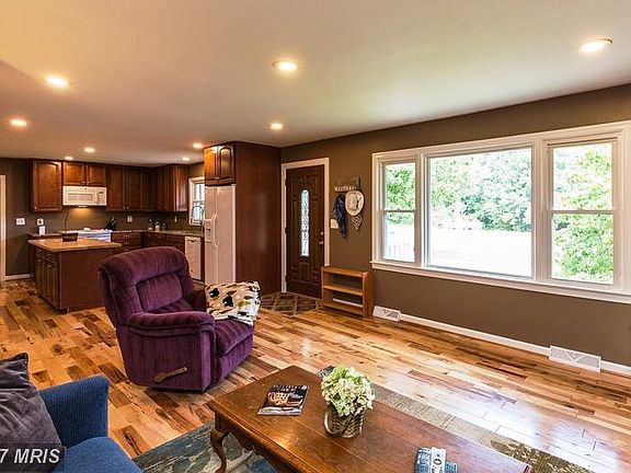 Family Room  w/ view of kitchen and front entry