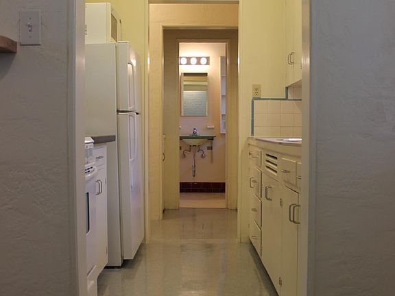 View From Dining Area through Kitchen toward Bath