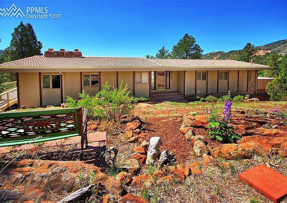 Concrete tile roof, private setting, lots of walk-outs to decks/patios