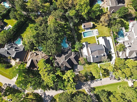 Ariel of the house as you can see the house is surrounded by lots of trees.