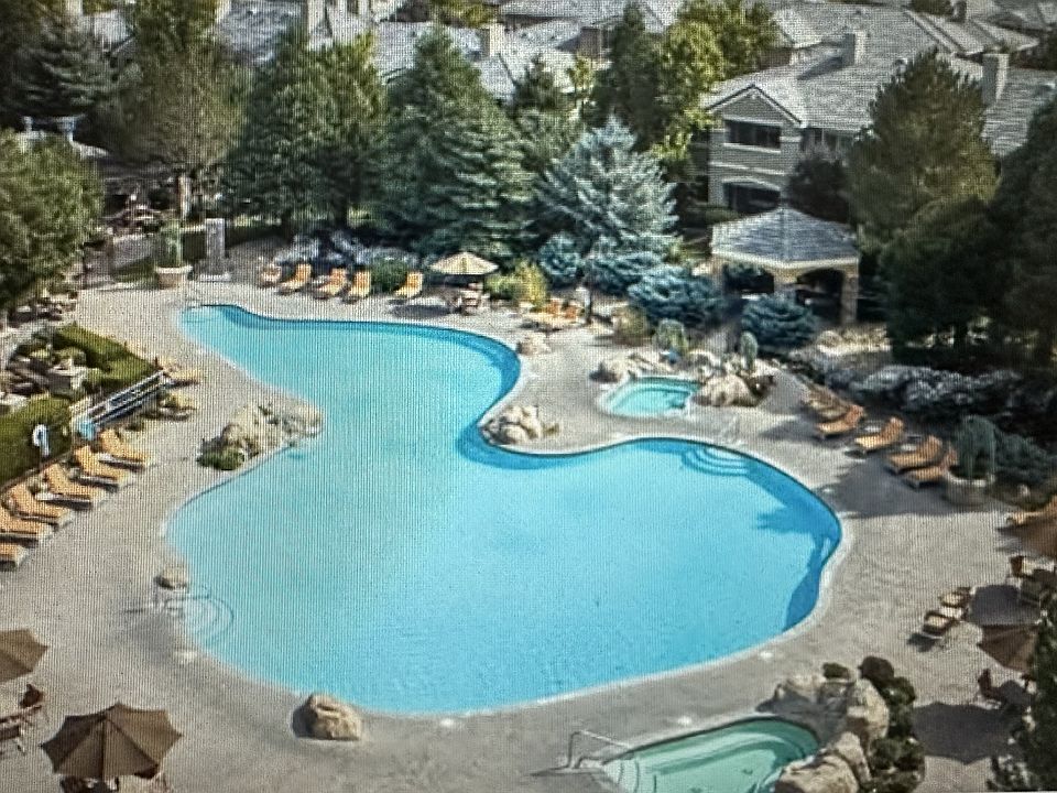 The pool and spas are heated year round. Any wind is blocked by trees and buildings - very pleasant all year.