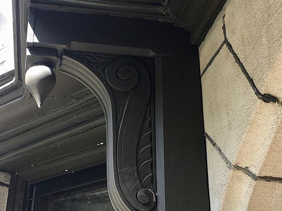 Shaw's attention to craftsmanship is evident in the detailing above the front entry door.